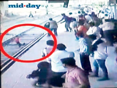 CCTV footage from Ambernath station shows the ATS constable Sandeep Bhosle yanking the five-year-old boy off the tracks, saving him from an approaching train