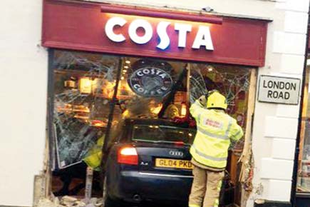 Car crashes into cafe in UK, kills one