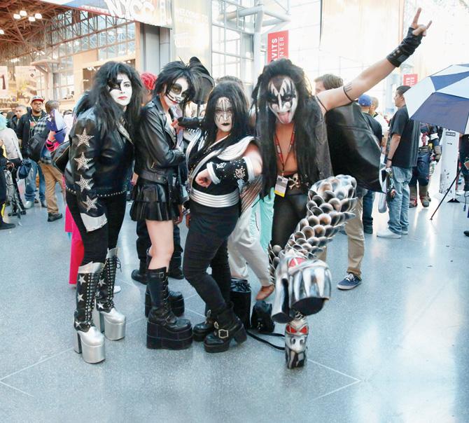  Cosplayers dressed as band members of KISS pose at  New York Comic Con  2015 in October. pic/AFP