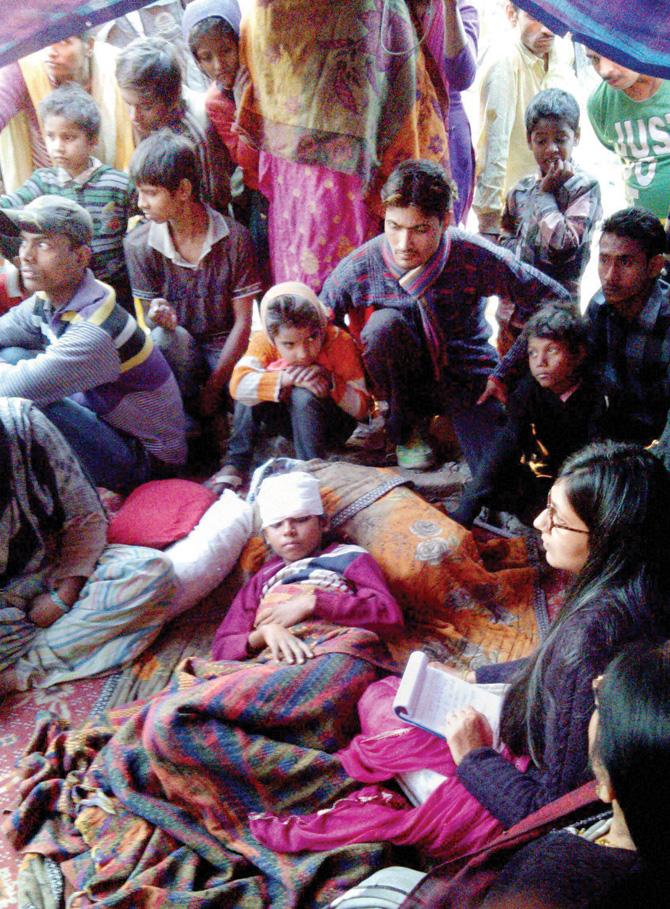 Delhi Commission for Women chairperson Swati Maliwal met people affected by the demolition drive. Pic/PTI