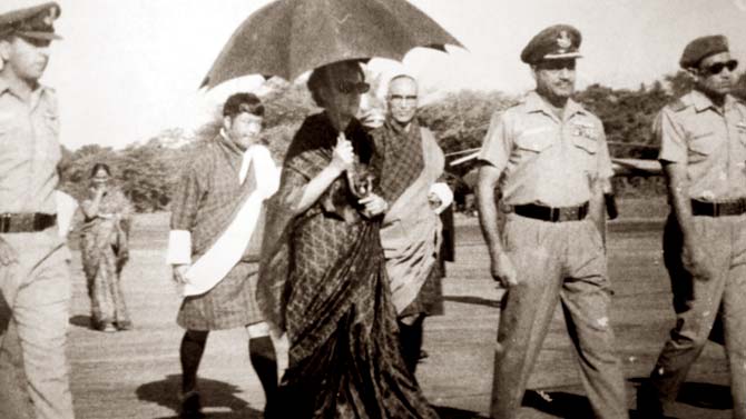 Then Prime Minister Indira Gandhi and Group Captain KP (Ken) Misra, on her  post-war visit to the Hashimara base to express gratitude
