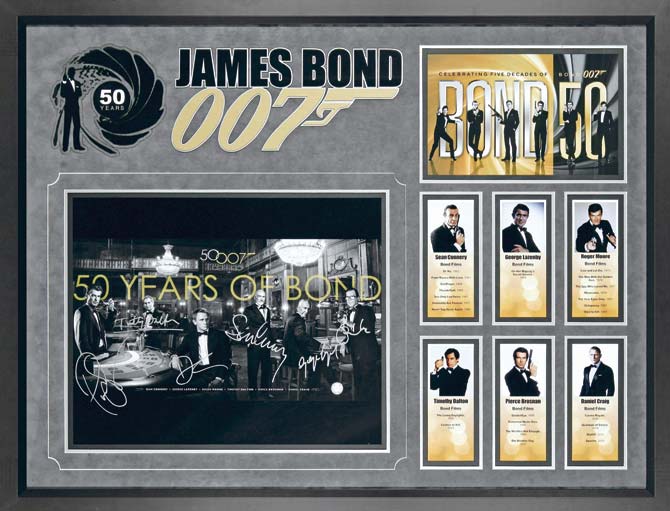 The signed picture by actors who have played Bond so far