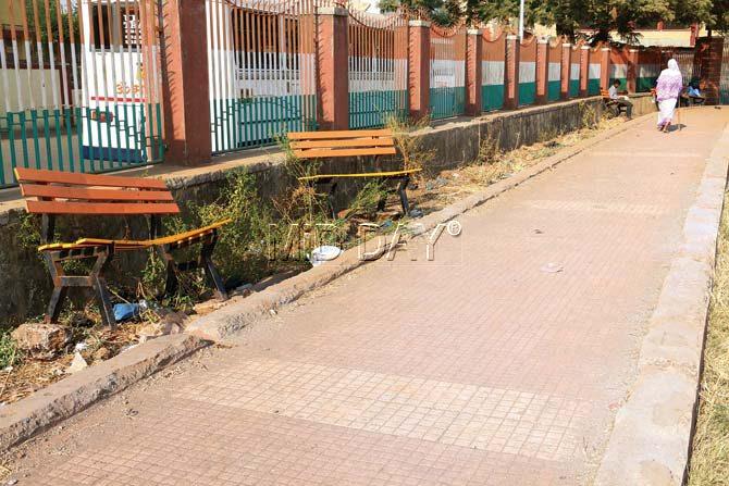 Broken benches at the playground in Kalina. The ground has become inaccessible to the residents. Pics/Swarali Purohit
