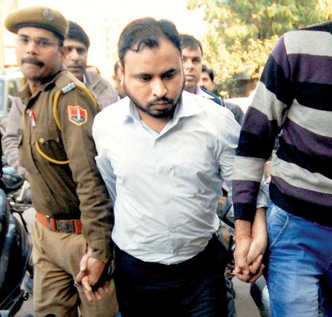 Suspected ISIS agent Mohammad Sirajuddin appeared in a Jaipur court on Friday. Pic/PTI
