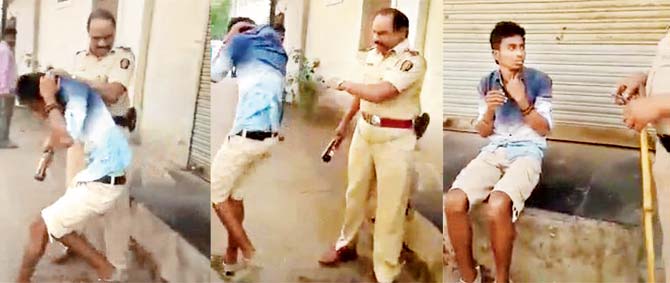Senior Police Inspector Mohan Waghmare is seen thrashing the youth