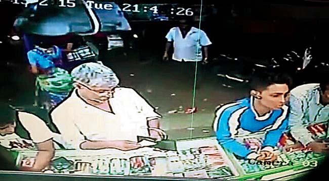 The accused Rahul Jha (in blue) was captured by the CCTV cameras located at the medical store