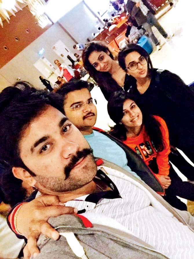 Passenger Sanjay Joshi seen here with his family at the airport