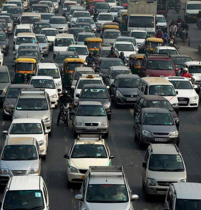 Vehicles clog the roads in New Delhi. Pic/AFP