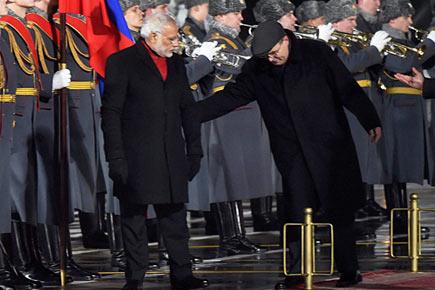 Oops! Modi walks during national anthem, Russian official nudges him back