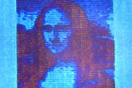 A microscopic Mona Lisa. She is 50 micrometres long or about 10,000 times smaller than the real Mona Lisa in the Louvre in Paris. (Photo: Technical University of Denmark (DTU)