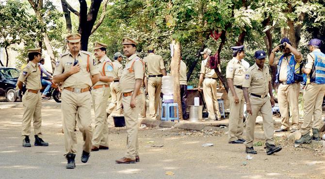 Police personnel deployed on the Osmania varsity campus. Pic/PTI 