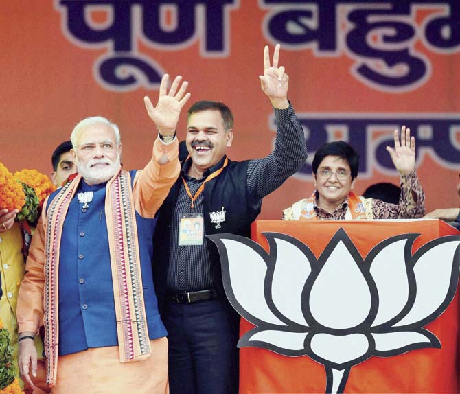 Like he swept polls across India for the BJP, Narendra Modi is hoping for an encore in Delhi, too. Pic/PTI