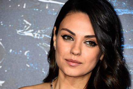 Mila Kunis makes first appearance post-delivery