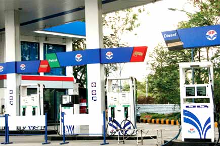 Petrol price cut by Rs 2.42 a litre; diesel by 2.25 per litre