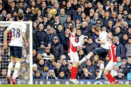 Kane and able Spurs shock Gunners