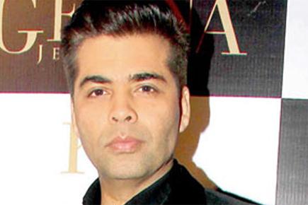 Karan Johar's new look in 'Bombay Velvet' gets a thumbs up from B-Town