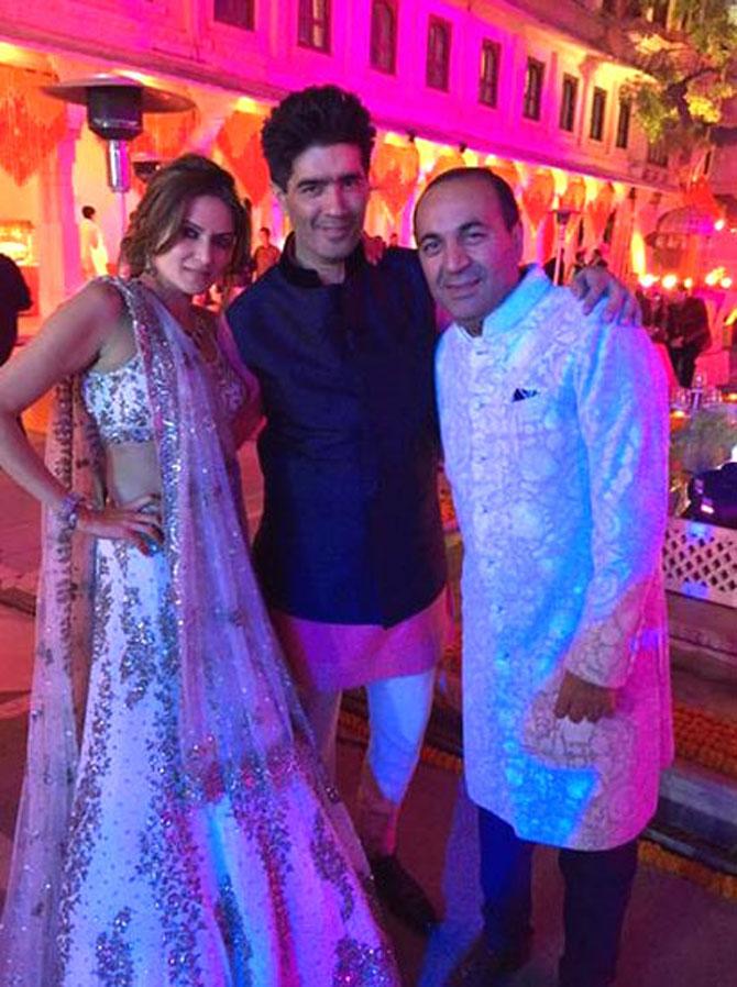 Manish Malhotra with bride Anu Mahtani and groom Sanjay Hinduja