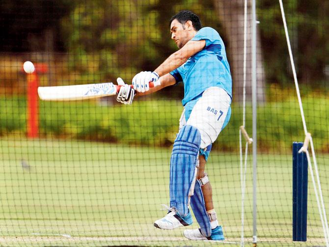 MS Dhoni bats in the nets at Adelaide yesterday. PIC/AFP