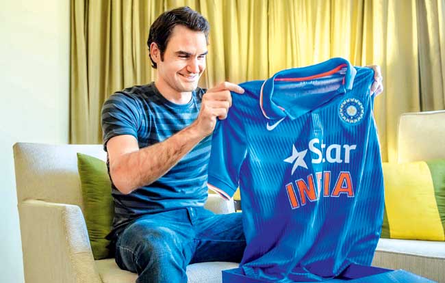 A picture that Roger Federer shared on Facebook of him admiring an Indian team jersey