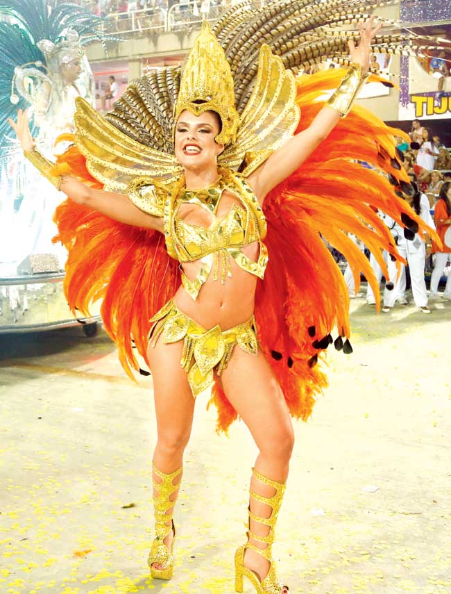 Brazilian actress Paloma Bernardi participates in the Rio Carnival parade. Pics/Getty Images, AFP