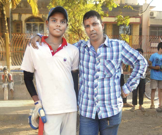 Brijesh Sahani (left) with his coach Rajesh Parker. The 16-year-old went back to practising the game after he was discharged from the hospital