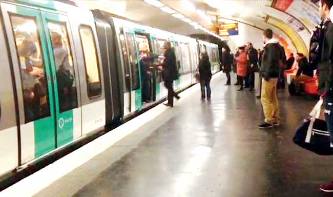 A video grab taken from footage obtained from Guardian News  & Media Ltd shows Chelsea football fans packed onto a Paris Metro train pushing a passenger to prevent him from boarding the carriage at a station in Paris on Tuesday. PIC/AFP