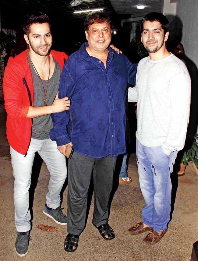 (L-R): Varun Dhawan with dad, David (centre) and brother, Rohit (right) 