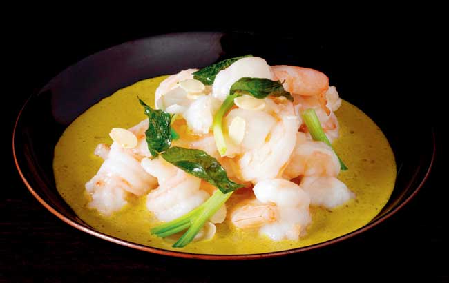 Spicy Prawns Curry with almonds and waterchestnuts is a beautifully-cooked dish