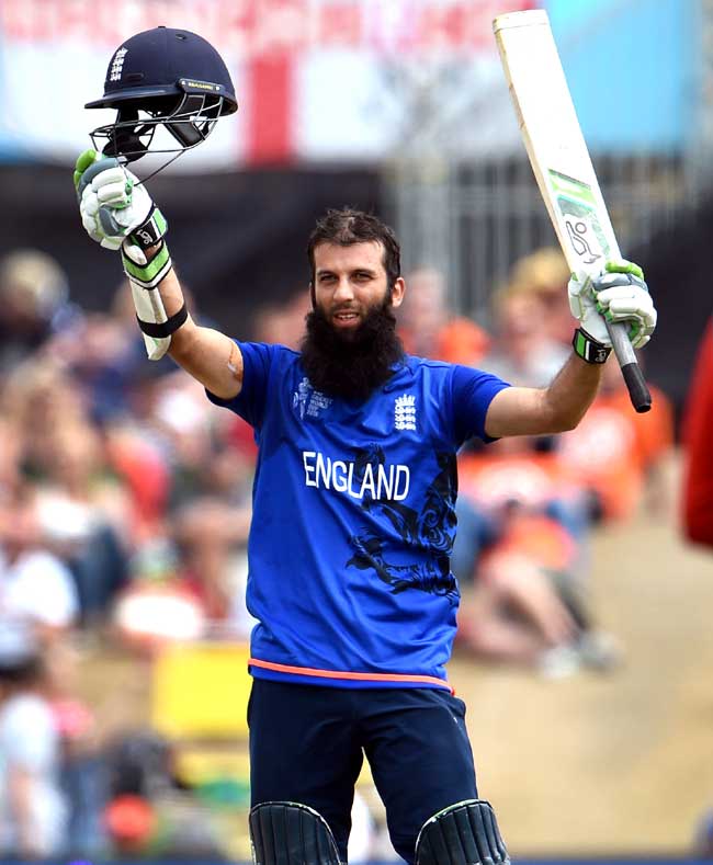 England batsman Moeen Ali acknowledges the applause after scoring his century against Scotland during their 2015 Cricket World Cup Group A match in Christchurch. Pic/AFP