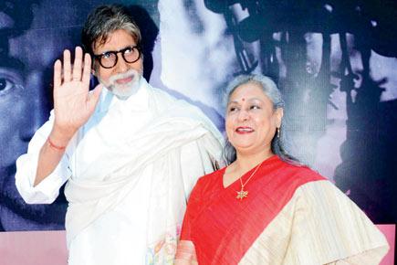 Who is Big B giving a high-five to?