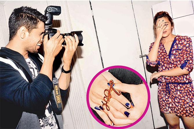 Sidharth Malhotra tries out his photography skills on the red carpet. Check out Alia’s interesting ‘Love’ finger cuff (inset) 