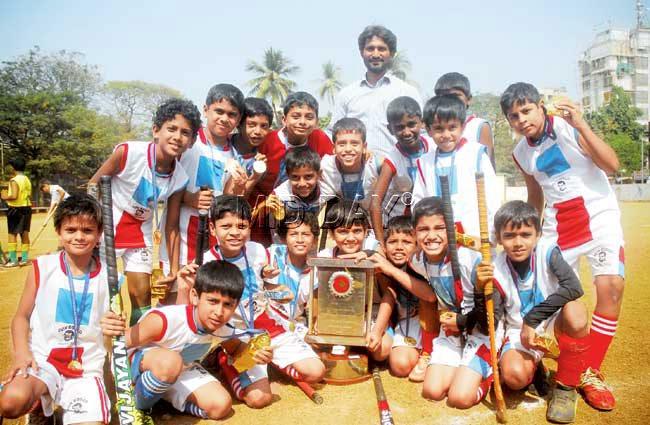 The Don Bosco under-10 team with the trophy. Pic/Sameer Markande