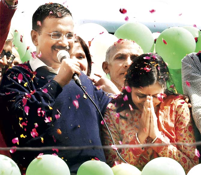 Kejriwal speaks about his wife Sunita’s support, as he addresses supporters at Patel Nagar in New Delhi yesterday. Pic/PTI