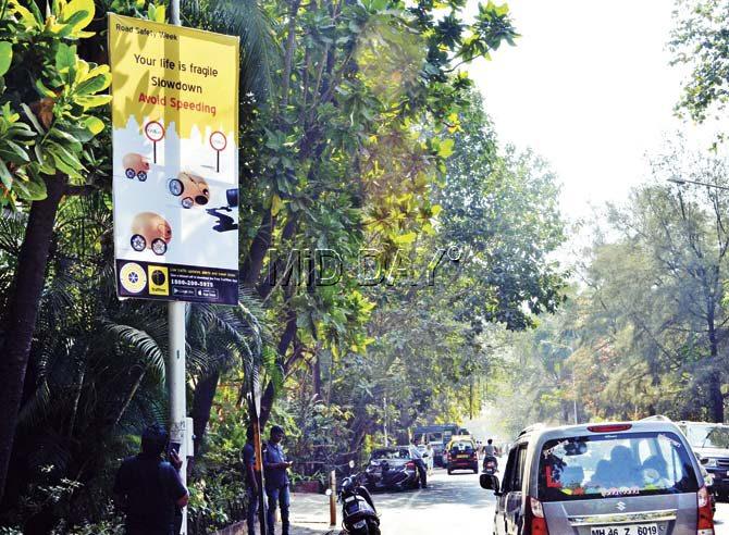 mid-day had complained about this illegal banner and two others opposite the Traffic Police Department office in Worli on Tuesday. All the banners were still there in the same spots on Wednesday. Pics/Datta Kumbhar, Satyajit Desai