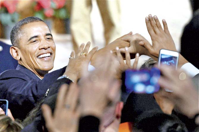 Most of us journalists did not sense that Obama was admonishing us in any manner, and that was perhaps because of the infectious enthusiasm in the youth present in the auditorium. They clapped and cheered and nodded in agreement with all that he had to say about India. Pic/PTI