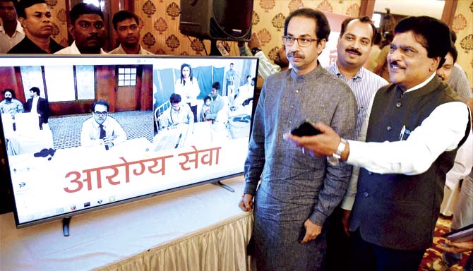 Uddhav Thackeray with Health Minister Dr Deepak Sawant at the launch of the Shiv Aarogya Sena (tele-medicine) scheme. File pic