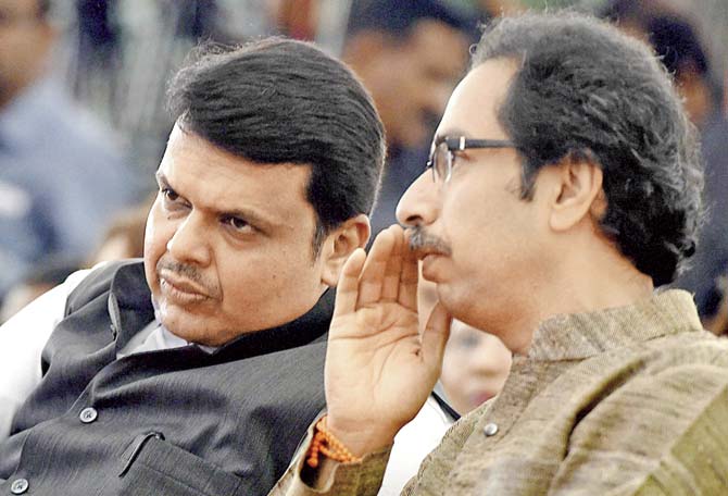 CM Devendra Fadnavis and Sena chief Uddhav Thackeray. Despite being in government together, the two parties have been exchanging barbs frequently and publicly. File pic/PTI