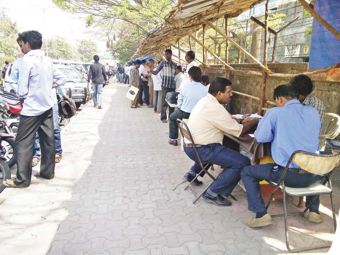 Illegal touts were seen doing business as usual on Monday