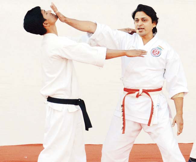 Martial arts exponent Vispi Kasad (right) leads a basic self-defence lesson at a Gujarat government event for women’s safety. Hopefully, the younger generation will speak out when they are attacked and break those old entrenched patterns of staying silent for a bit of peace. Pic/AFP