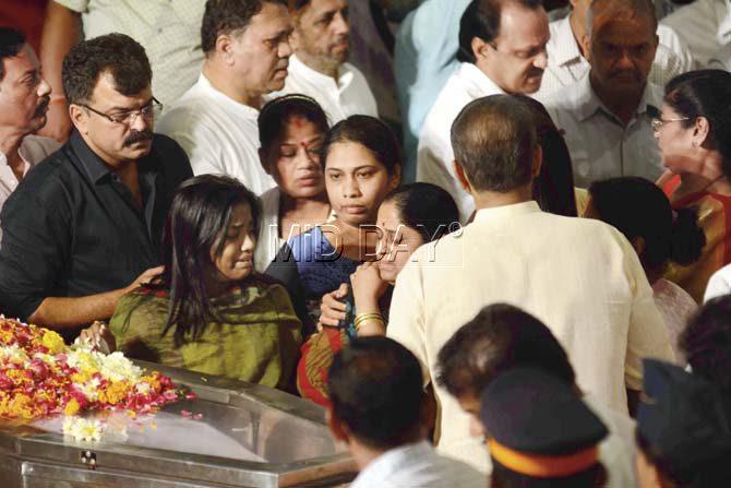 R R Patil’s wife and daughter (in green) at the NCP headquarters yesterday. Pic/Atul Kamble