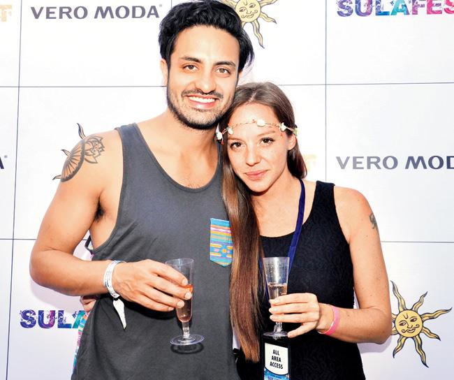 Cecilia Oldne with Sameer Gadhia, lead singer of the band, Young the Giant 