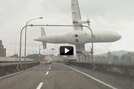 Watch Video: Passenger plane plunges into river in Taiwan
