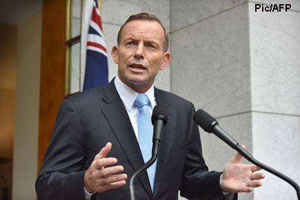 Australian PM Tony Abbott survives bid to unseat him
