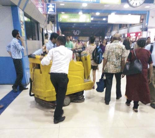 Staffers hide away a seemingly unused cleaning machine at Churchgate and bring in a new one
