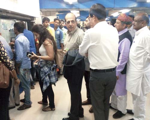 Dinesh Trivedi in the queue at Churchgate