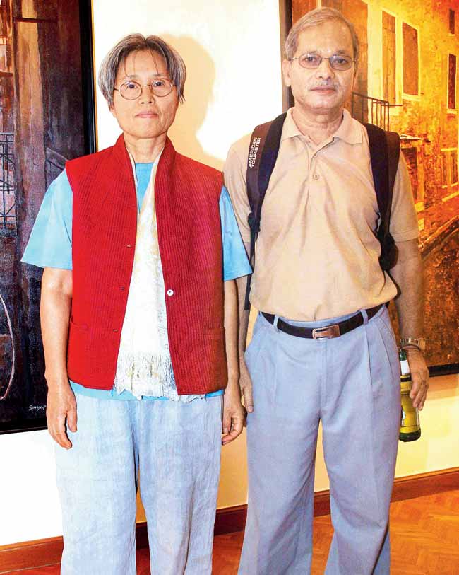 Vijay Shinde with his wife, Jinsook