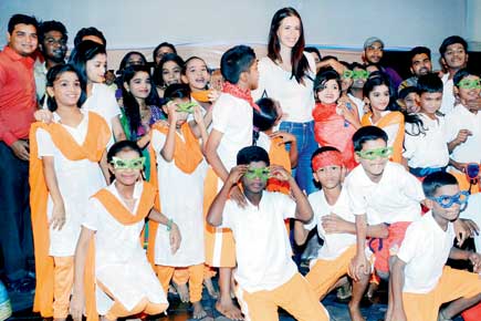 Spotted: Kalki Koechlin watches a children's play in Dharavi