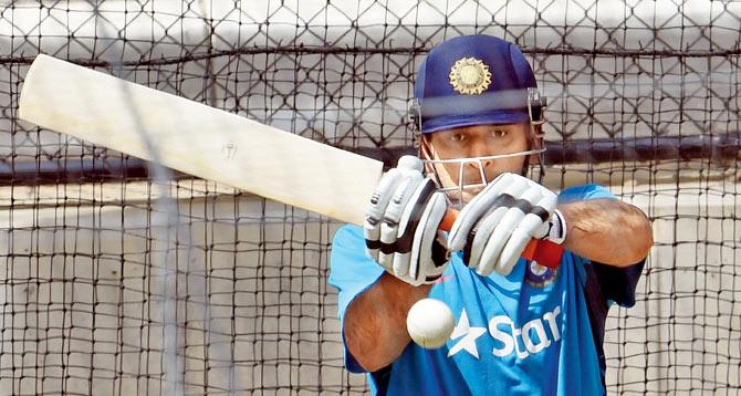 Skipper Mahendra Singh Dhoni bats in the nets ahead of India’s World Cup opening clash against arch-rivals Pakistan at the Adelaide Oval on Saturday. Pic/AFP