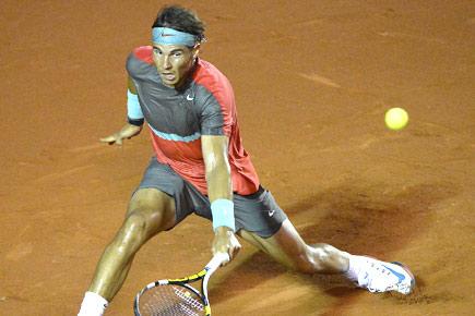 Defending champion Rafael Nadal advances in Rio Open