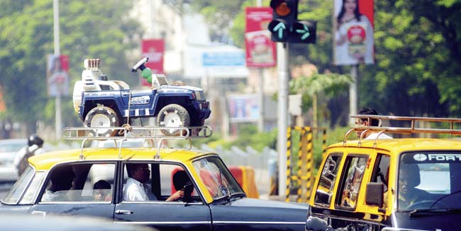 Transport officials said a proposal involved fitting GPS devices in black and yellow taxis, in order to keep a tab on the movement of every taxi plying in the city. File pic for representation